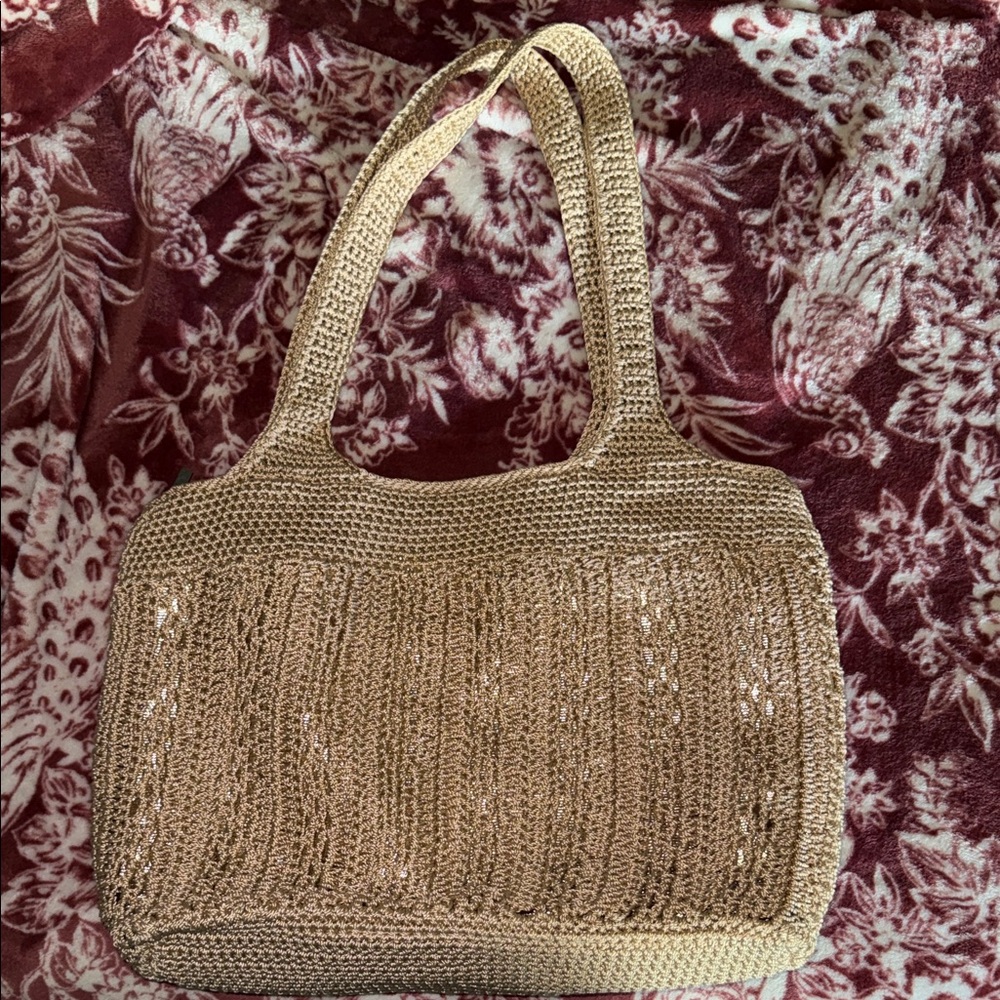 The Sak woven straw-look shoulder bag in beige w gold ac